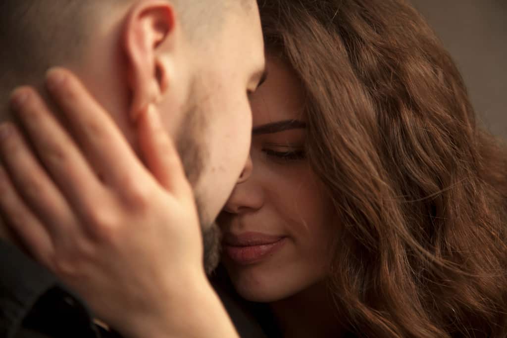 Man and woman embrace forgiveness